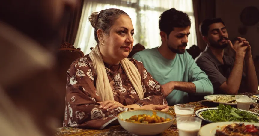 A South Asian family sharing a meal together — rebuilding family connection is one of the most powerful porn recovery tips, and a key step in learning how to quit porn and restore trust